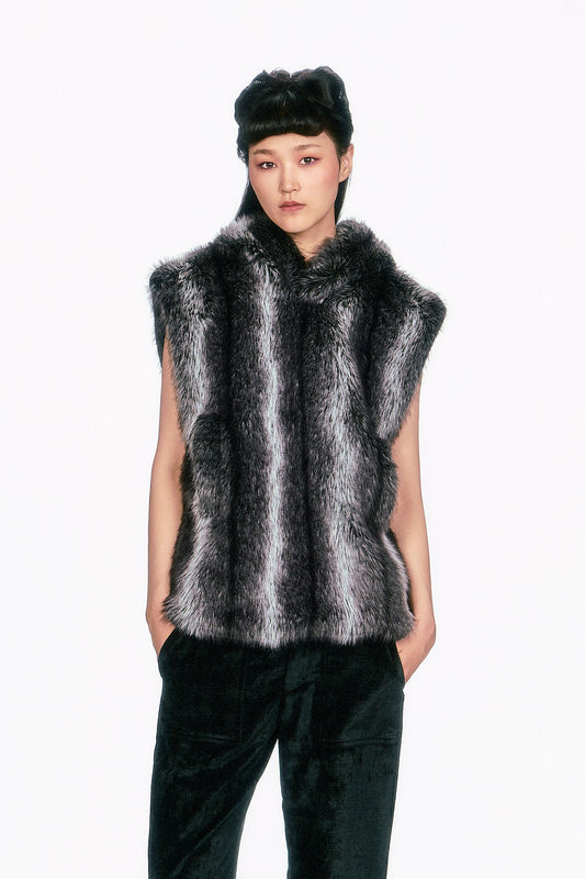 Stay warm in luxurious plush with this Faux Silver/black Fox Hoodie. Sleeveless, fluffy V-collar