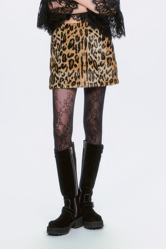 Bold and playful, the Faux Leopard Mini Skirt features a fierce animal print and a flattering, modern fit. 