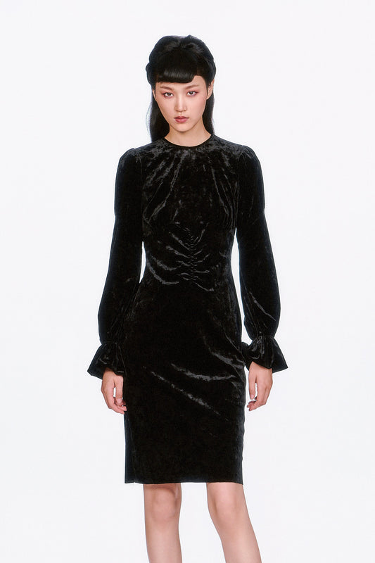Black Velvet takes center stage in the Boudoir Long Sleeve Dress, a statement in sophistication