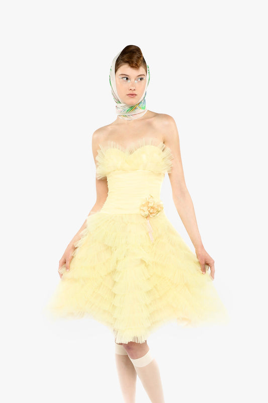 The Lemon Party Girl Strapless Tulle Dress is a stunning blend of elegance and playfulness