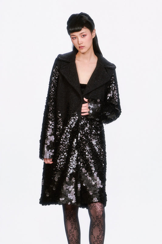 Sparkle and Glimmer, the Paillettes Wool Coat features a textured pattern and comfortable fit