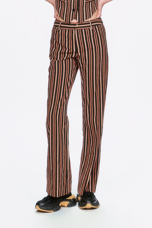 A modern take on a classic, the Pinstripe Pants features sharp tailoring and timeless stripes. 