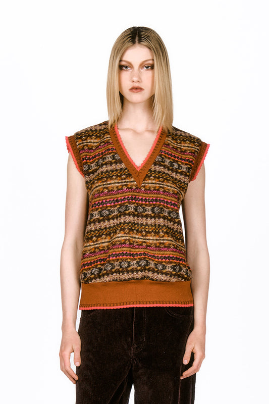 Fair Isle Fleece Vest, sleeveless, v-cut collar, elastic band on hips, hems are in cinnamon hue