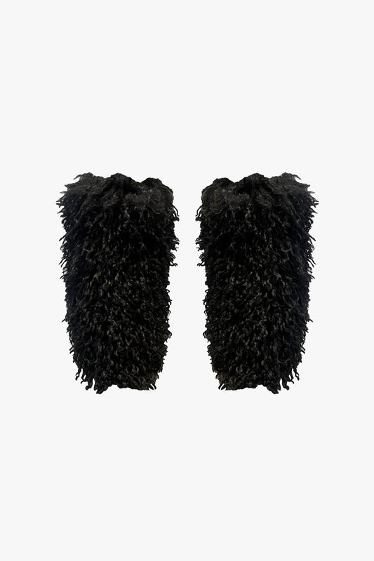 Featuring voluminous, textured faux fur with a curly finish, leg warmers add a twist to any outfit